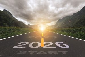 2026, the new year 2026 or the beginning of the concept of the word 2026, written on a road in the middle of a paved road with a sunset mountain backdrop. Planning ideas and challenges. 2026, the new year 2026 or the beginning of the concept of the word 2026, written on a road in the middle of a paved road with a sunset mountain backdrop. Planning ideas and challenges.